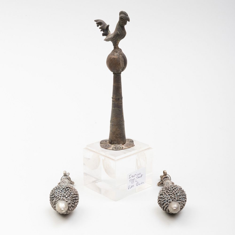 Appraisal: Persian Metal Bird Finial and a Pair of Persian Metal