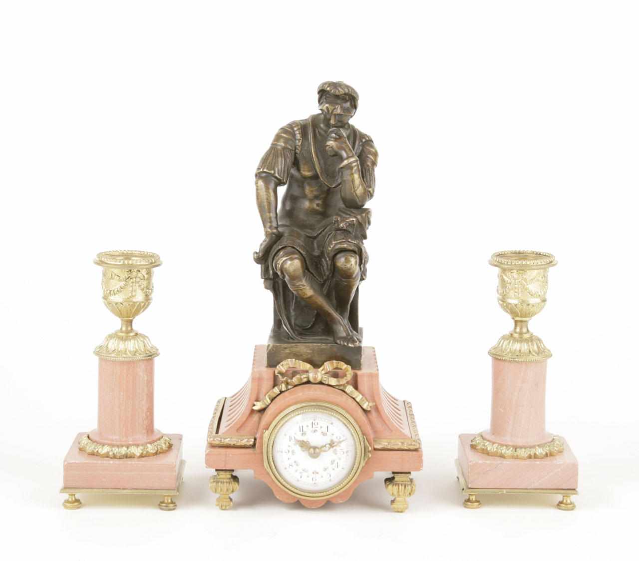 Appraisal: An assembled French gilt bronze and marble miniature clock garniture