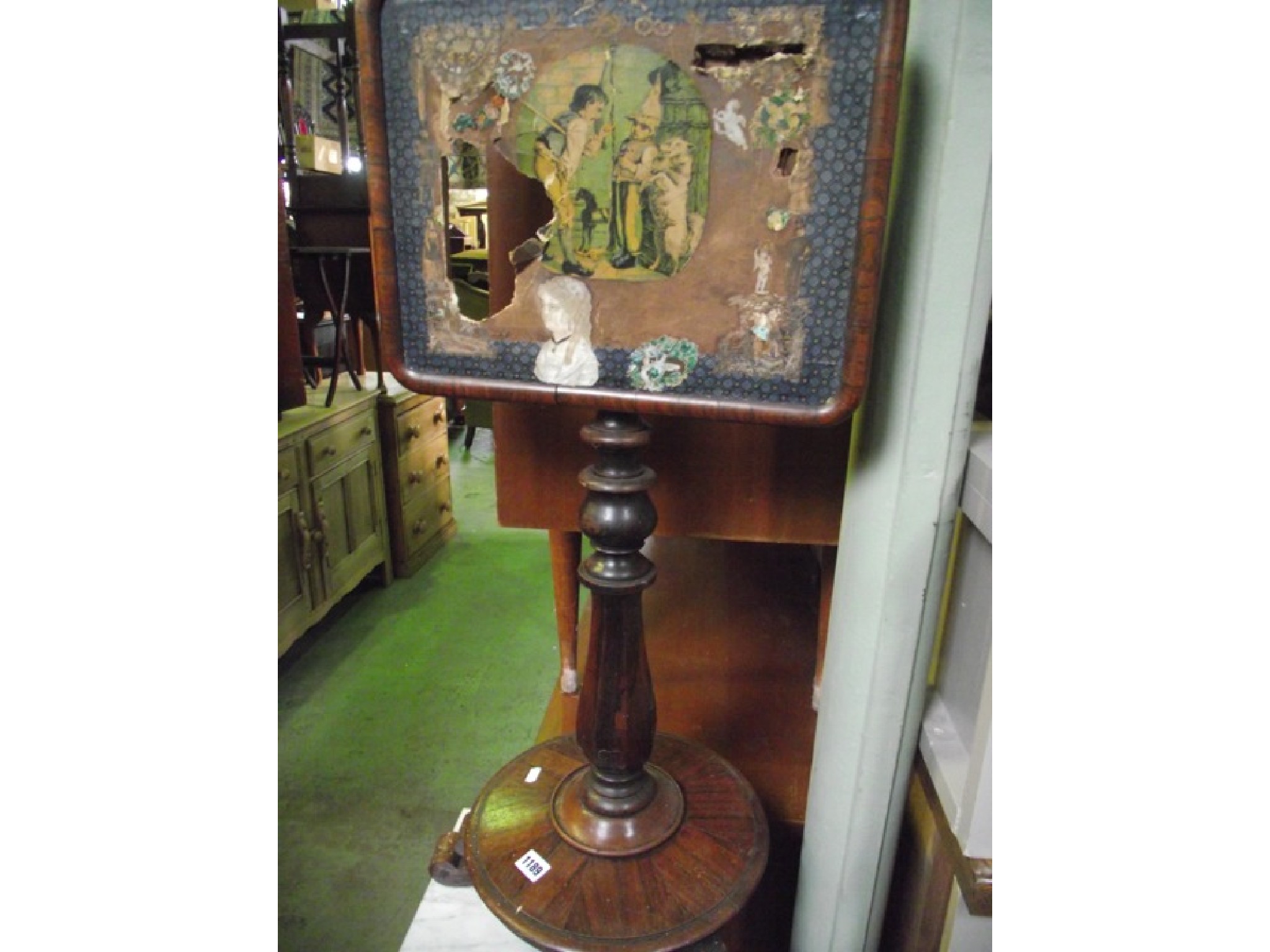 Appraisal: A th century rosewood veneered pole screen with partially turned