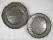 Appraisal: Judaica Two plates with Hebrew inscriptions a pewter plate for