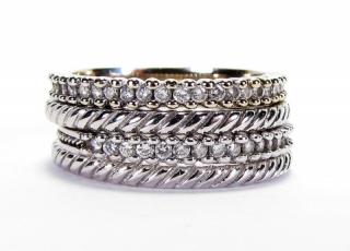 Appraisal: Description Four Hidalgo K white gold micro band rings including