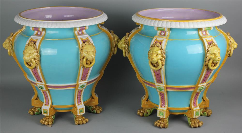 Appraisal: PAIR OF LARGE MINTON MAJOLICA LIONS HEAD JARDINIERES dated -