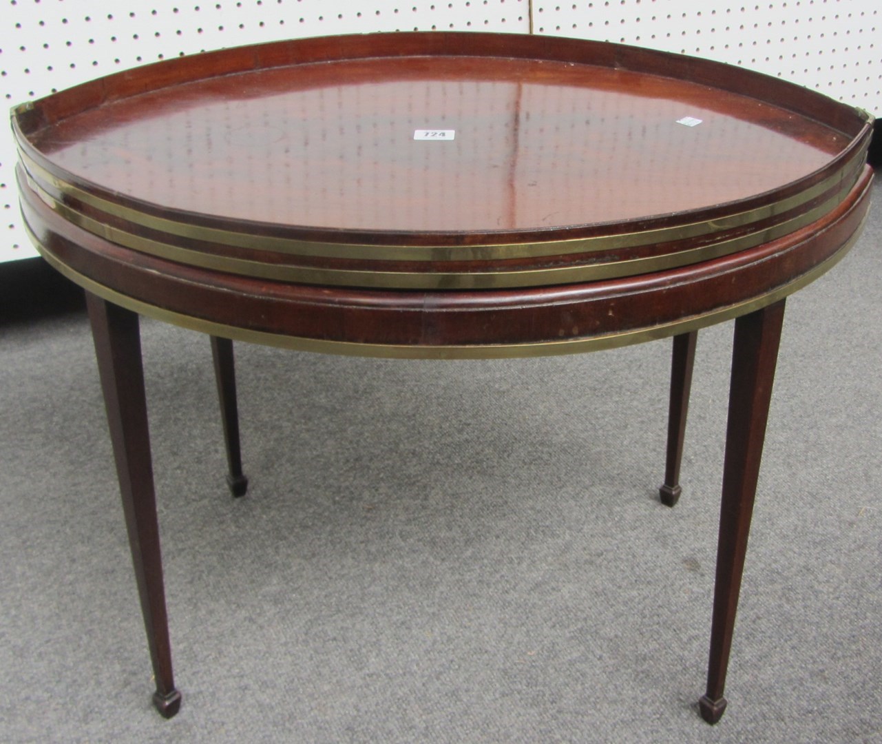 Appraisal: A th century coopered mahogany navette shape tray top occasional