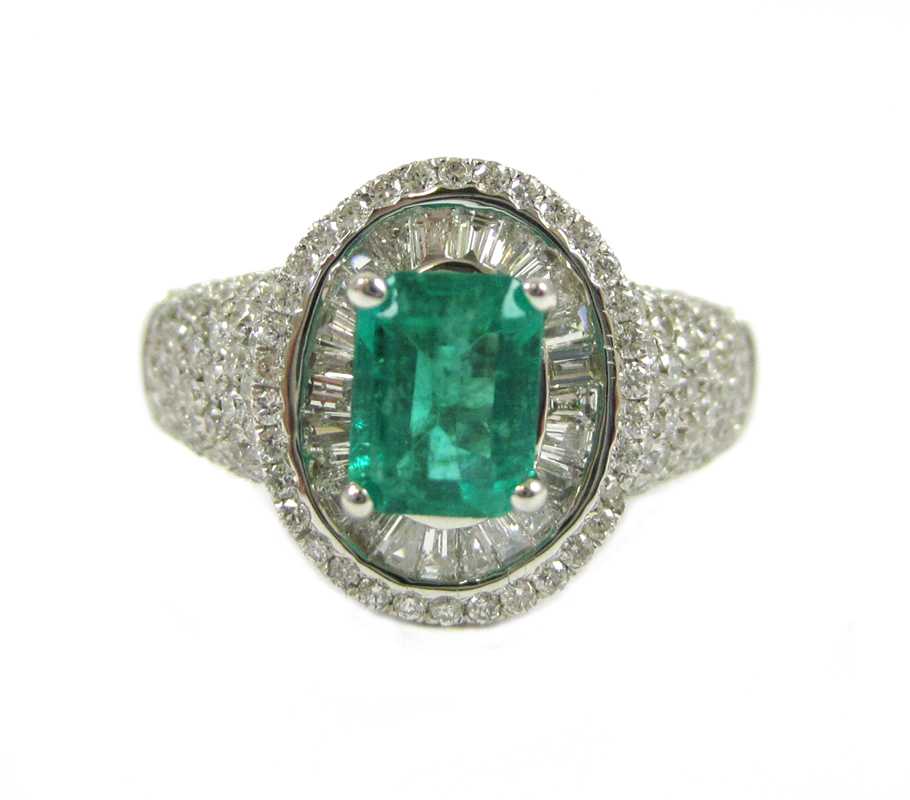 Appraisal: EMERALD AND DIAMOND KARAT WHITE GOLD RING the emerald-cut green