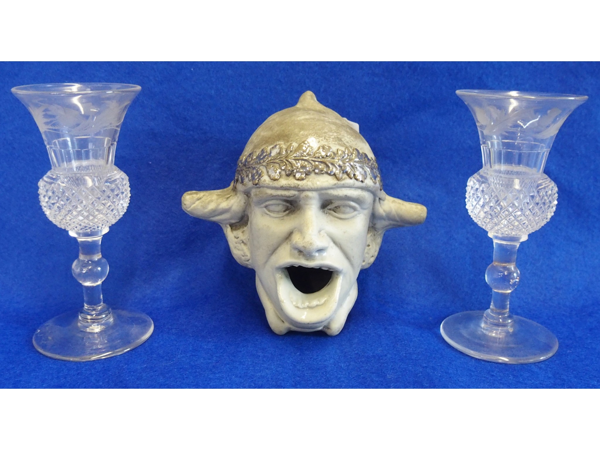 Appraisal: Pair of glass thistle cordials and a pottery figural table