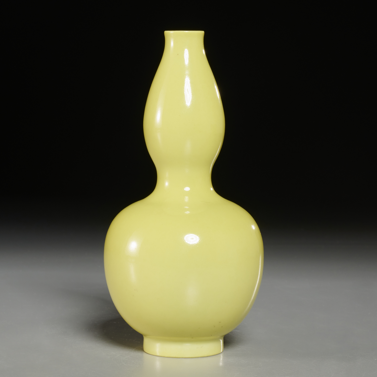 Appraisal: CHINESE MONOCHROME YELLOW DOUBLE GOURD VASE Daoguang mark and possibly