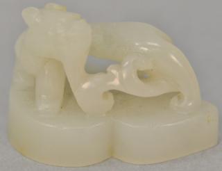 Appraisal: White jade seal with open work carving ht in White