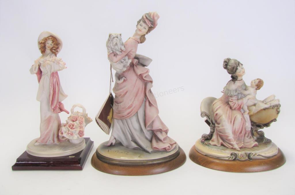 Appraisal: Three Bruno Merli Resin Figures one depicting mother laying child