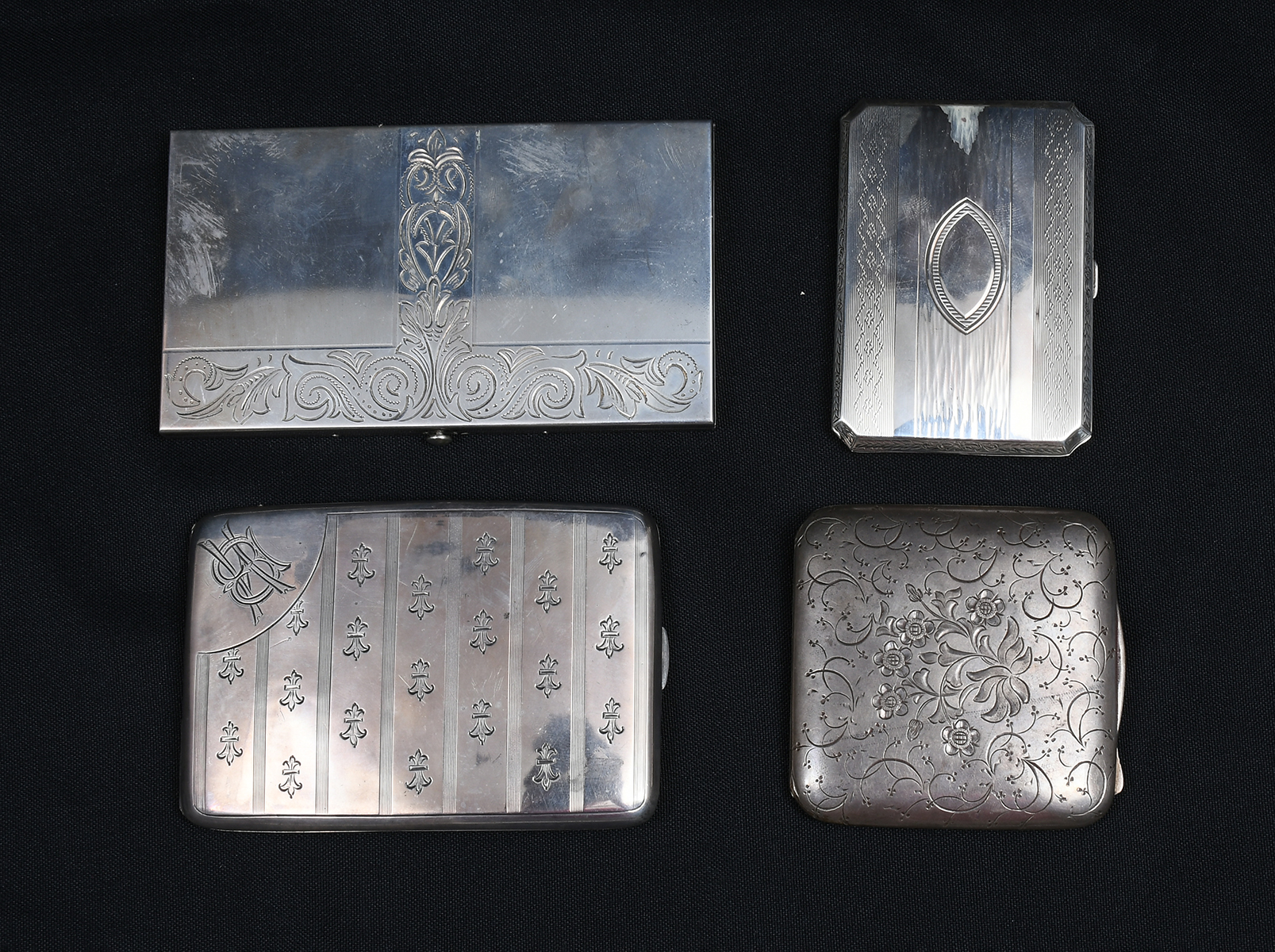 Appraisal: ENGRAVED SILVER CIGARETTE CASES COMPACT Comprising - Curved English case