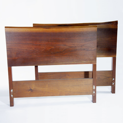 Appraisal: GEORGE NAKASHIMA Pair of walnut twin-size headboards with free-edge top