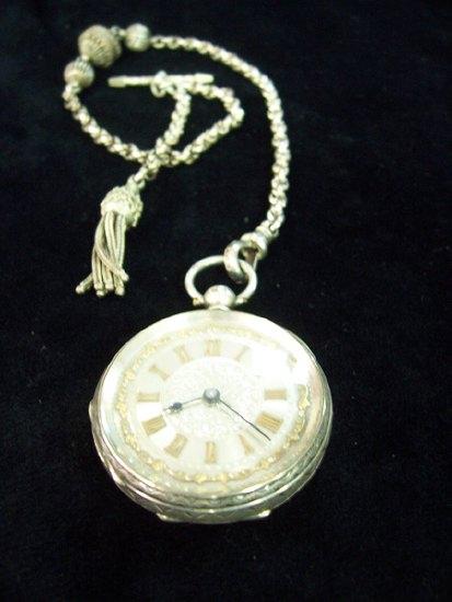 Appraisal: A late Victorian pocket watch the case stamped the silvered