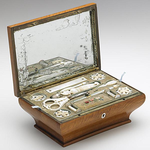 Appraisal: SATINWOOD SEWING BOXMother-of-pearl sewing implements include scissors tape measure and