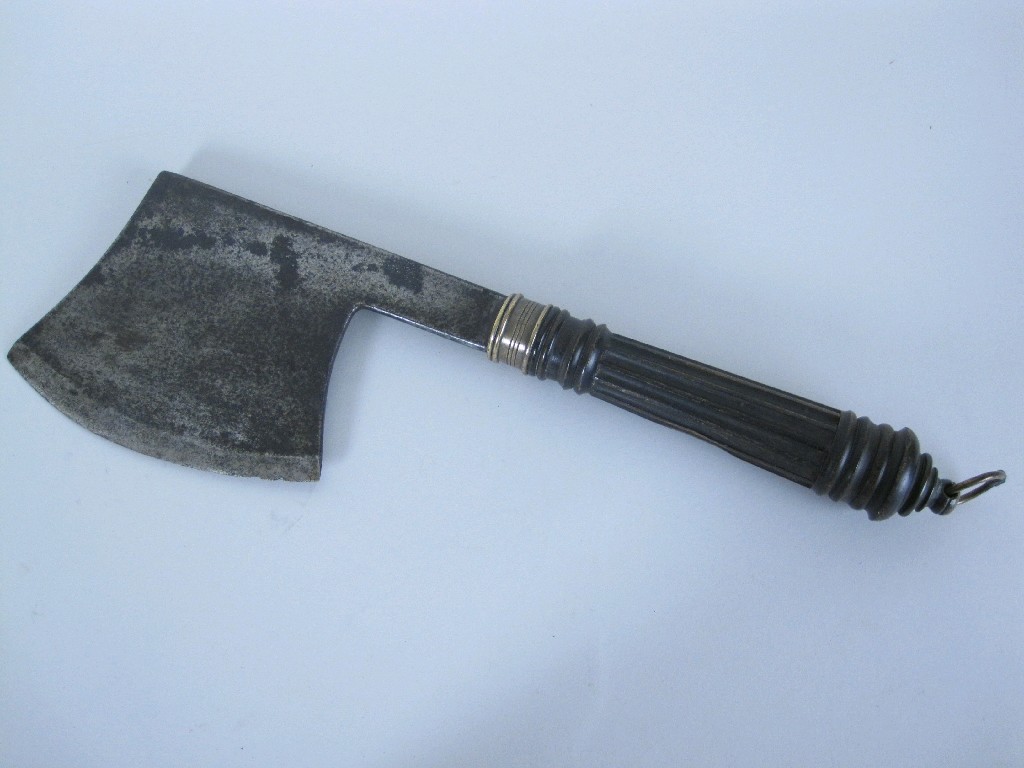 Appraisal: A Georgian steel bladed Axe with fluted turned handle brass