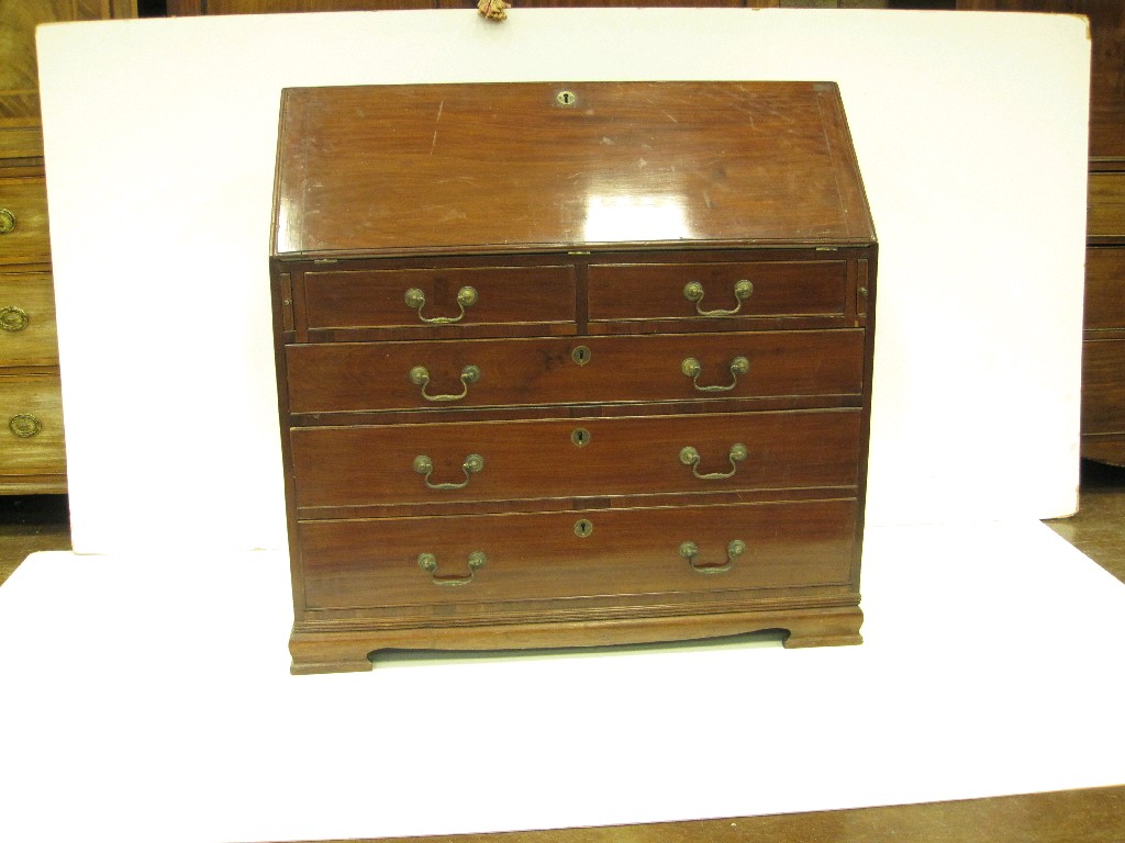 Appraisal: A Georgian mahogany Bureau the fitted interior with shell inlaid