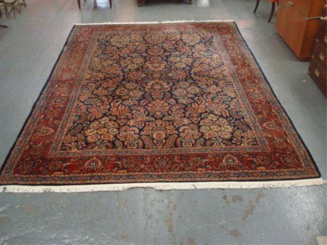 Appraisal: Roomsize Sarouk Carpet Blue burgundy cream with single border From