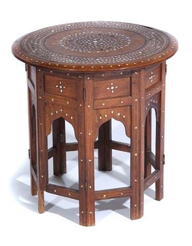 Appraisal: A MOORISH HARDWOOD AND INLAID CIRCULAR OCCASIONAL TABLE on a