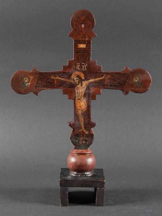 Appraisal: Russian painted wood crucifix th century painted on front and