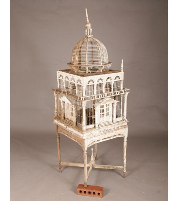 Appraisal: Ornate dome top Victorian birdcage on stand various classical architectural