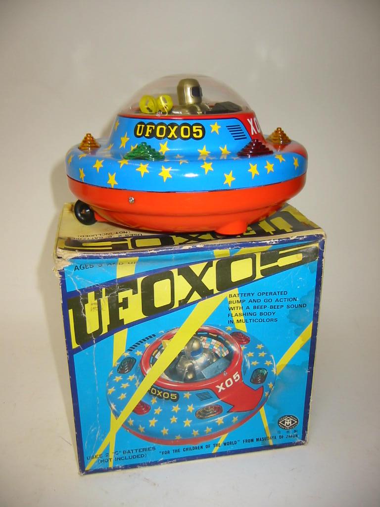 Appraisal: A UFOXO Flying Saucer by Masudaya Japan tin plate plastic