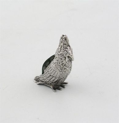 Appraisal: A cockatoo pin cushion with textured plumage by Levi Salaman