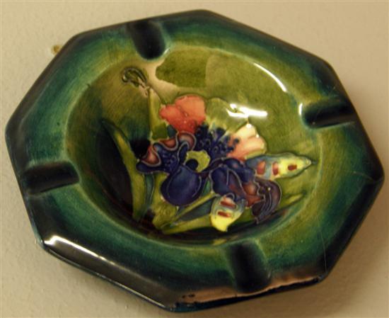 Appraisal: Moorcroft ashtray decorated with a floral sprig on a blue