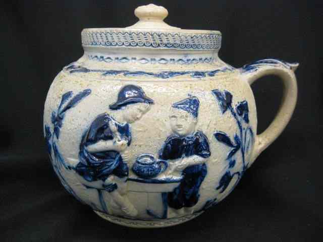 Appraisal: Blue Decorated Stoneware Bean Pot one side with boys at