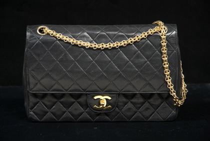 Appraisal: Black Chanel quilted kidskin purse s With CC logo turnlock