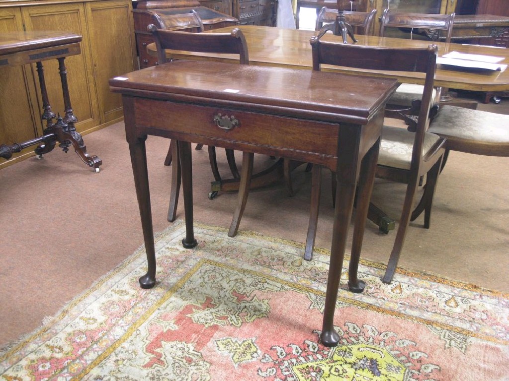 Appraisal: An early George III mahogany tea table rectangular shape with