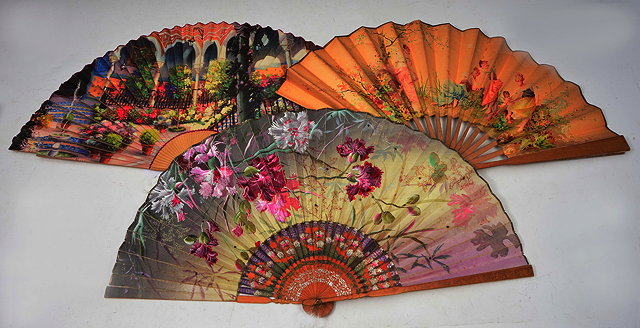 Appraisal: A GROUP OF THREE ENGLISH PAPER FANS with printed decoration