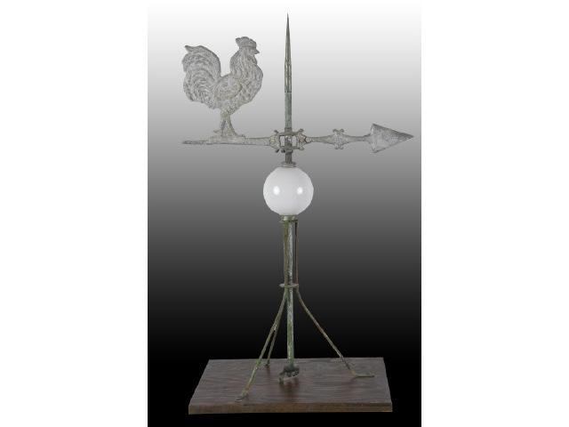 Appraisal: Rooster Weathervane Description Circa Mounted on board Milk glass lightening