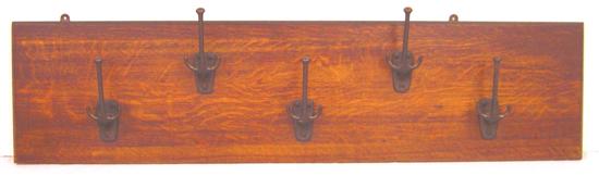 Appraisal: Hanging oak coat rack with five hooks attributed to Gustav