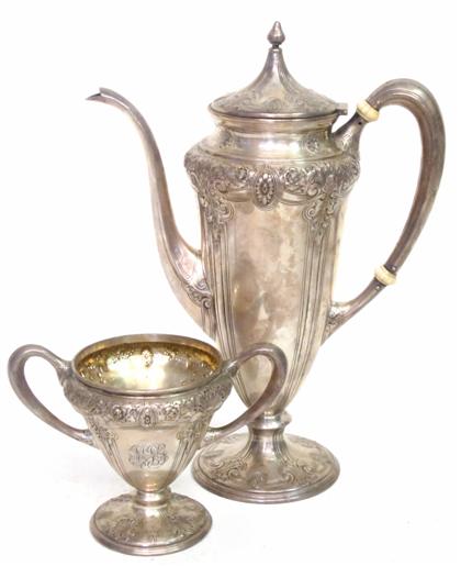 Appraisal: Sterling silver after-dinner coffee pot and matching open sugar bowl