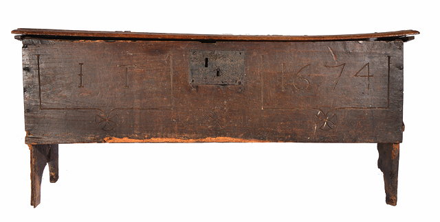 Appraisal: AN ANTIQUE OAK SIX-PLANK COFFER carved with initials 'IT' to