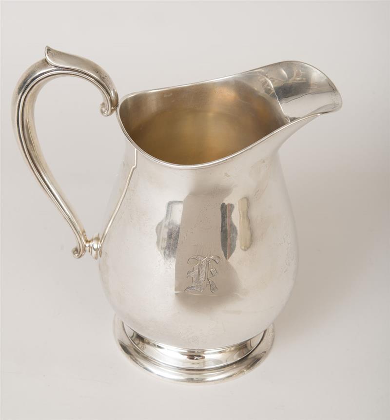 Appraisal: FISHER MONOGRAMMED SILVER WATER PITCHER Monogrammed with lower case 'k'