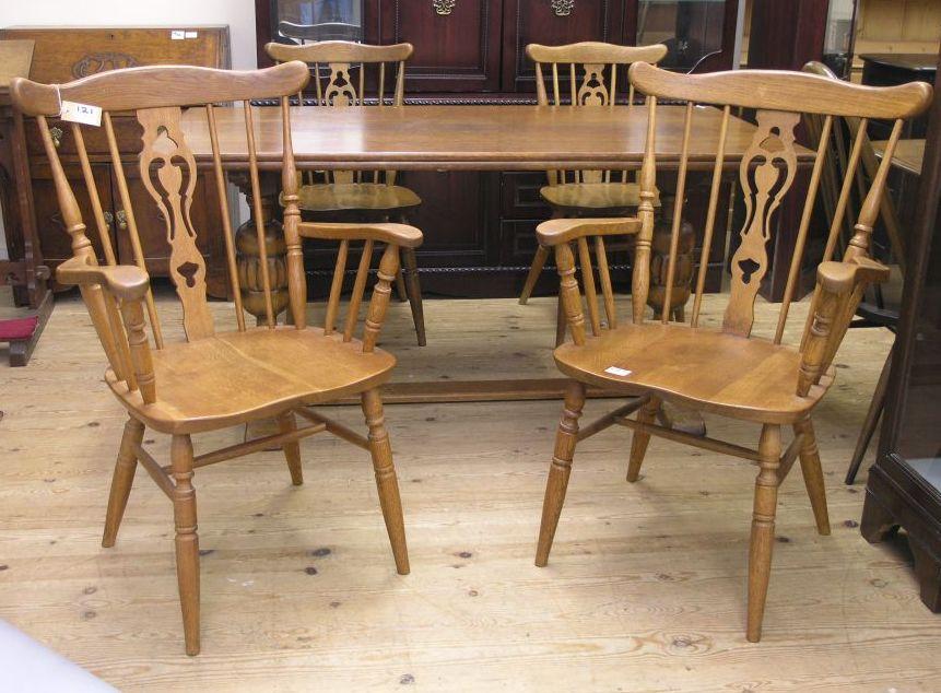 Appraisal: A medium oak dining room set consisting of refectory type