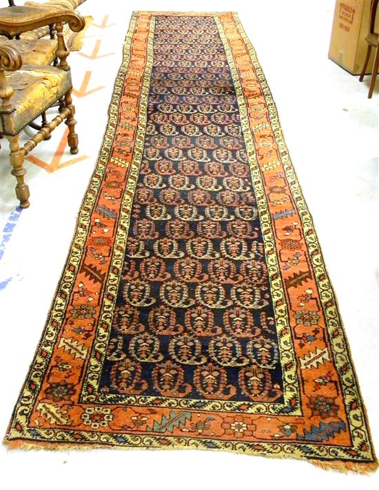 Appraisal: Antique Persian Bidjar runner navy field with terracotta border and