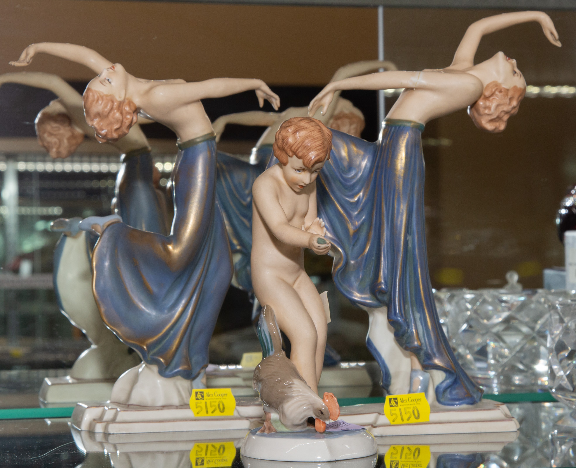 Appraisal: THREE CZECHOSLOVAKIAN ART DECO FIGURES Including a pair of Royal