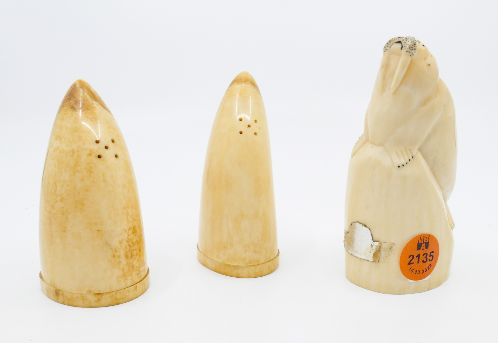 Appraisal: pc Alaskan Scrimshawed Walrus Figure and Shakers '' to ''