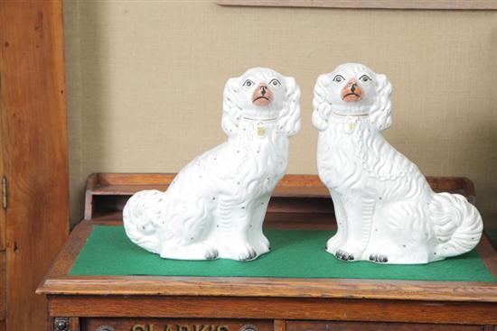 Appraisal: PAIR OF STAFFORDSHIRE SPANIELS Seated Spaniels with gilt collars and