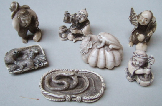 Appraisal: A group of seven ivory netsuke comprising a study of