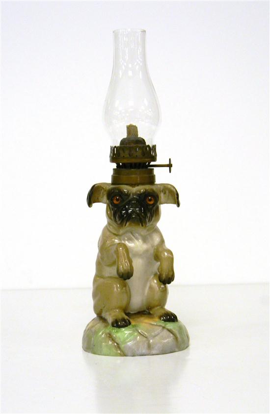 Appraisal: Porcelain figure oil lamp in the shape of a performing