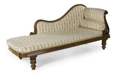 Appraisal: An early Victorian rosewood chaise lounge the cushioned back flowing