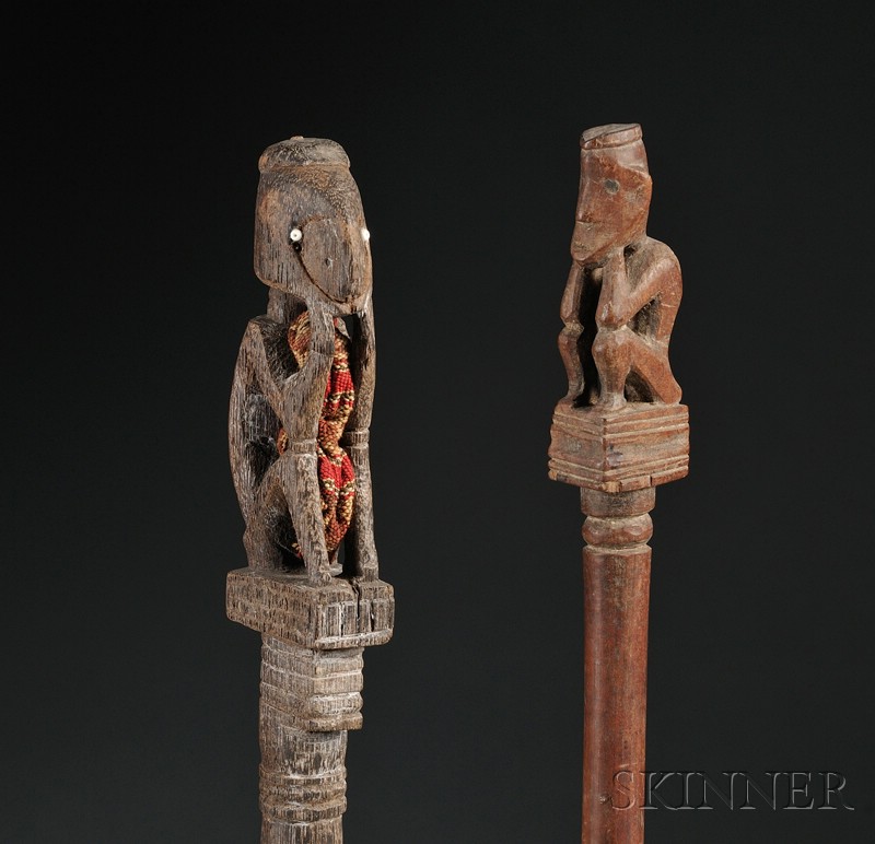 Appraisal: Two Indonesian Carved Wood Pig Trap Charms both with finials