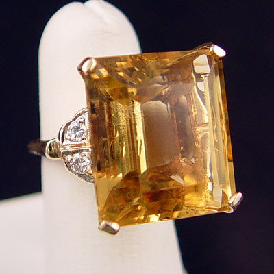 Appraisal: A CT CITRINE AND DIAMOND RING K yellow gold ring