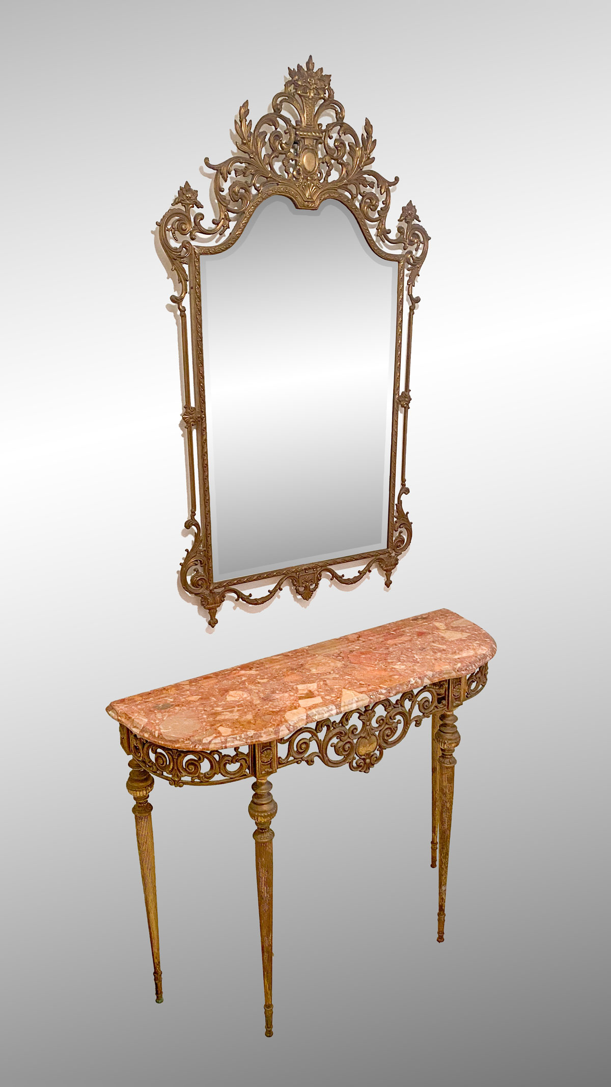 Appraisal: OSCAR BACH STYLE MARBLE TOP TABLE WITH MIRROR Bronze mirror