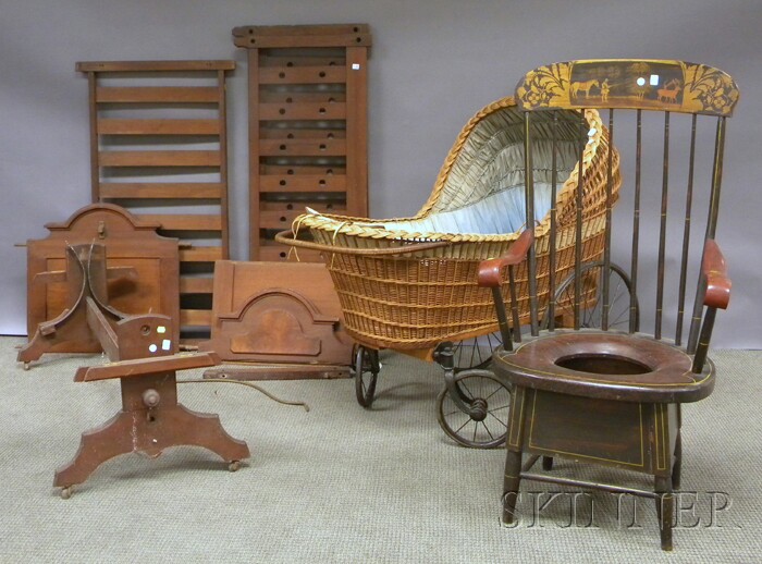 Appraisal: Renaissance Revival Walnut Crib a Late Victorian Wicker Rolling Bassinette