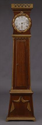 Appraisal: SWEDISH NEOCLASSICAL GRAINED WOOD AND PARCEL-GILT LONGCASE CLOCK The in