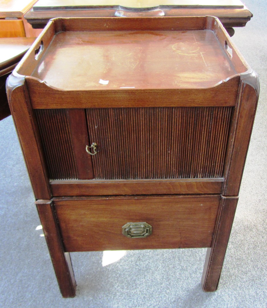 Appraisal: A George III mahogany bedside commode with tambour cupboard door