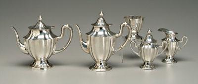 Appraisal: Mexican sterling tea service scalloped urn forms paneled urn finials