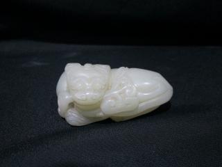 Appraisal: Chinese HETIAN White Jade Beast with Russet cm long Chinese